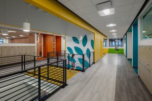 Photo-Hallway with windows and railings to look downstairs