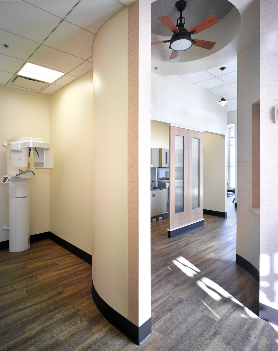 Dental Clinic hallway with curved walls and private area for dental xrays