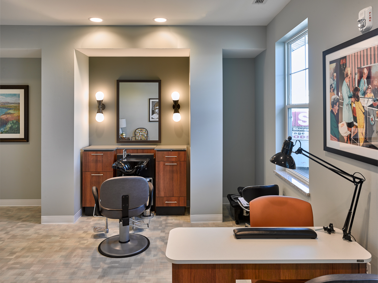 Senior living salon with nail station and hair salon chair