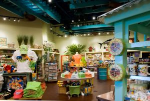 KeyLime Cove gift shop with bright colorful displays and teal colored shelving