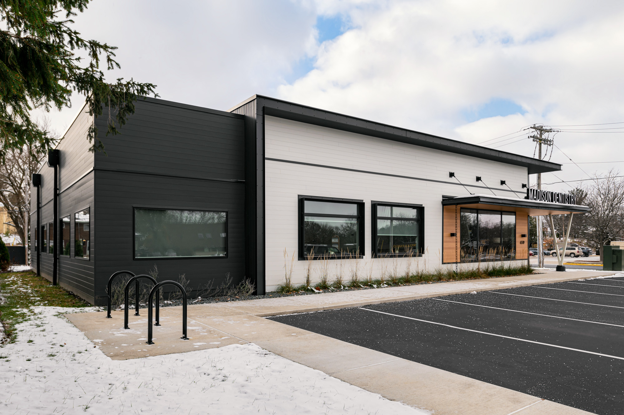 Exterior of Dental office with a side angle of the front of the building