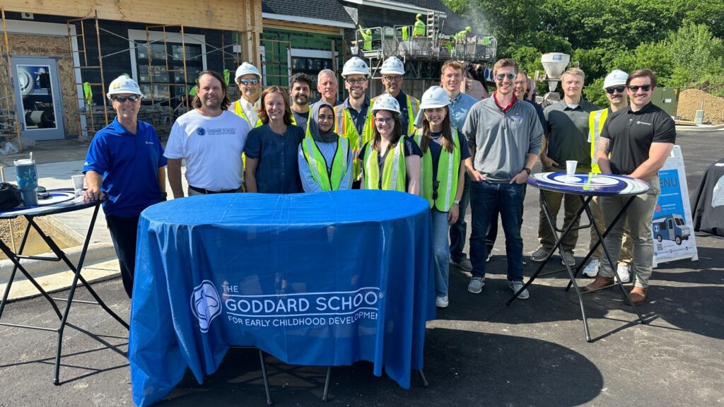 Group photo of The Goddard school owners and Iconica field staff