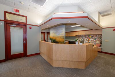 Dental office wood desk consultation area