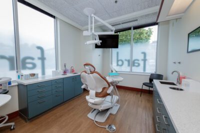 dental lab with chair and view of exterior windows