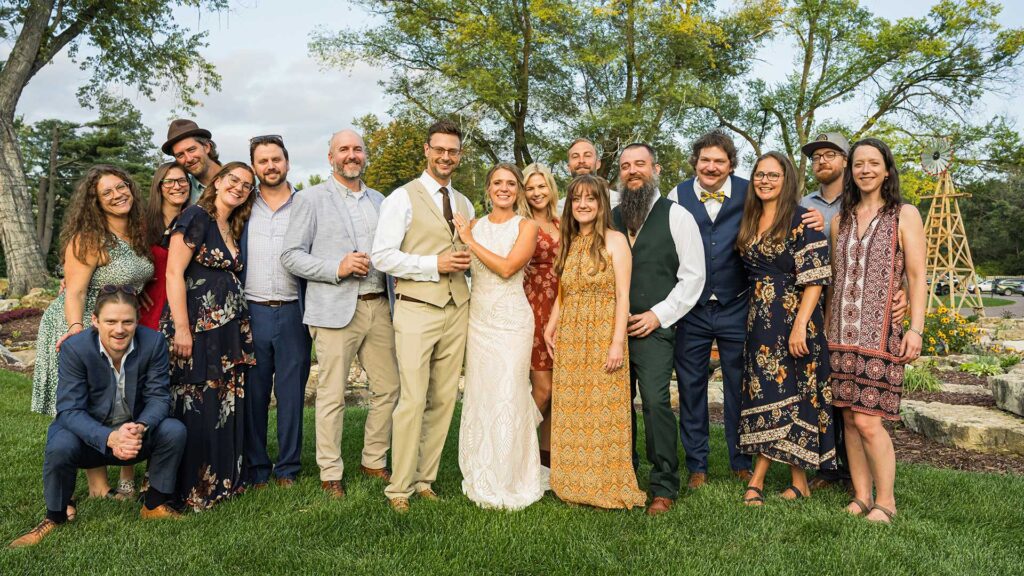 Group photo of Iconica employee at a wedding