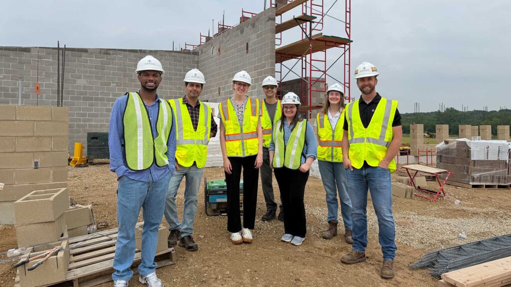 Group photo of interns at jobsite